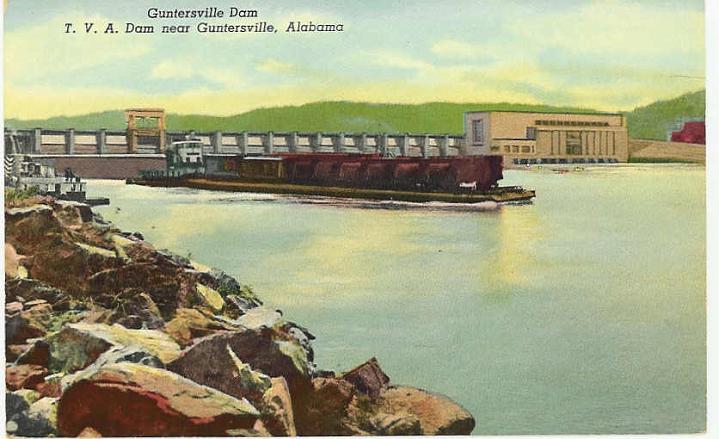 RR barge at Guntersville dam with rail road cars